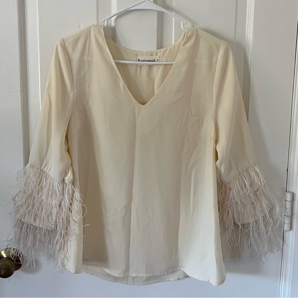 Ivory Blouse with Feather Sleeves